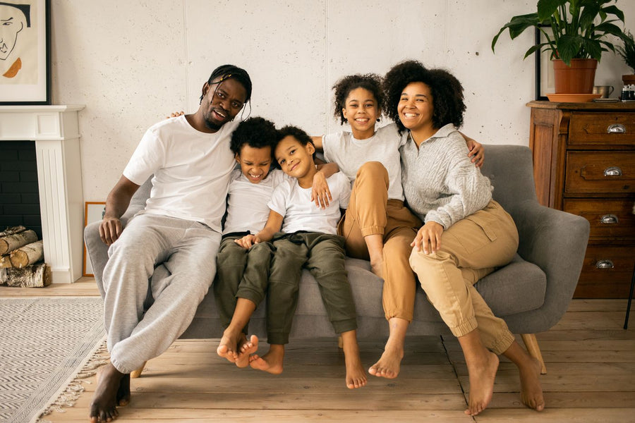 Family relaxing in a warm, comfortable home