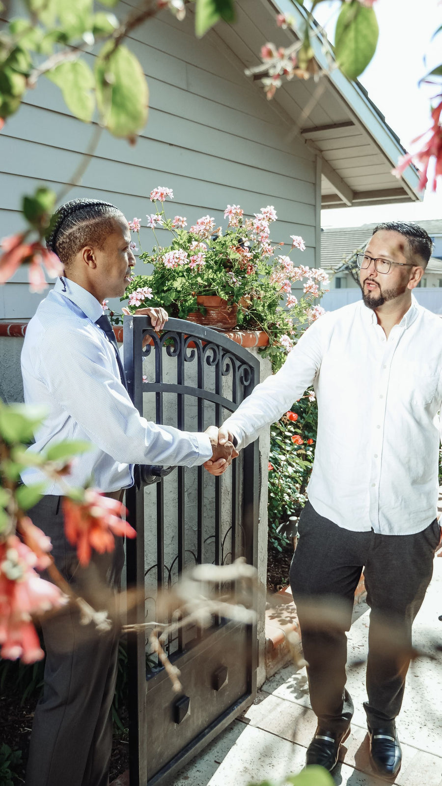 Homeowner shaking hands with a Mr. Heating & Home technician