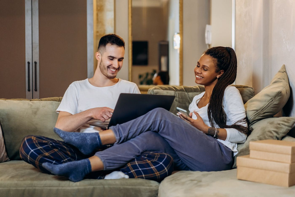 Couple choosing a new water heater online